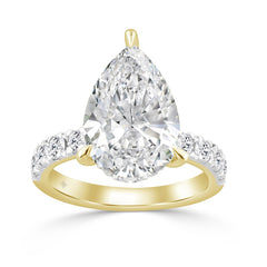 14K YELLOW GOLD 3 1/2CT ROUND/PEAR DIAMOND LADIES RING (CENTER STONE PEAR DIAMOND 3CT)